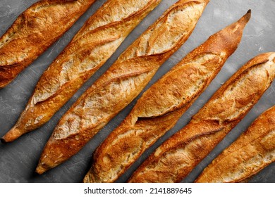 Freshly baked baguette on great background, top view - Shutterstock ID 2141889645