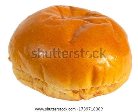 Freshly baked brioche bun isolated on white.