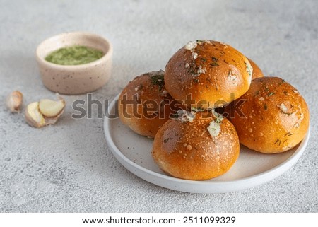 Freshly baked buns (pampushki) with garlic and dill for the first course (soup). National Ukrainian dish, food. Selective focus.