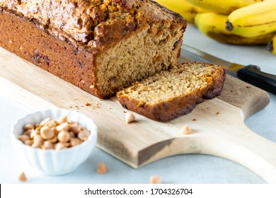 Freshly Baked Butterscotch Chip Banana Bread, Sliced Into And Ready For Eating.