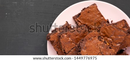 Similar – Image, Stock Photo Pink chocolate brownie in a tray on white table