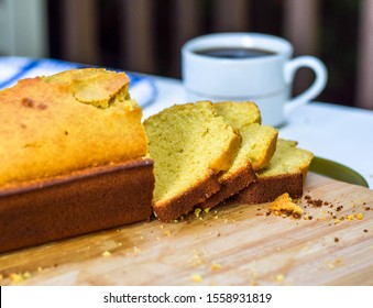 Freshly Baked Cornbread Slices And Loaf On A Cutting Board