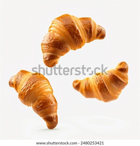 Freshly baked croissant flying in air, isolated on white background. French pastry croissants floating. Bread croissants flying in air isolated. Bakery fresh breads flying in air.