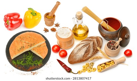 Freshly baked flatbread, rustic rye loaf, and Italian pasta are arranged with olive oil, colorful peppers, and tomatoes. This bright studio setup offers great copy space for recipes.