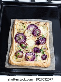 Freshly  Baked French Onion Tart On Baking Tray 