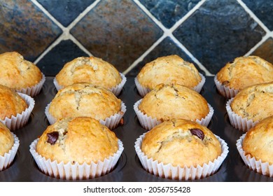 Freshly Baked Homemade Banana Chocolate Chip Muffins; Out Of The Oven Muffins In Muffin Cups