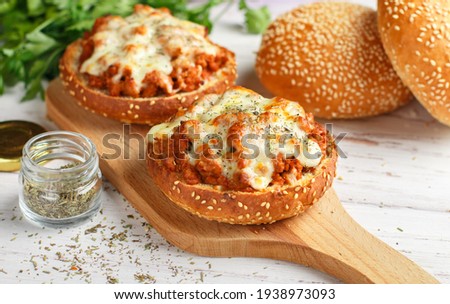 Similar – Mediterranean lunch or dinner with roasted dorado fishes, homemade focaccia bread , olive oil and olives served on rustic table with tableware and kitchen utensils, top view.