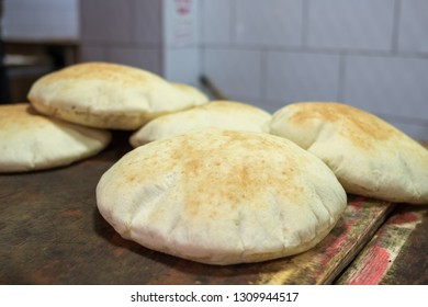 Freshly baked israeli flat bread pita close-up