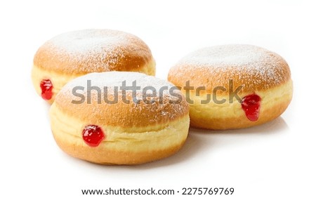 freshly baked jelly donuts isolated on white background