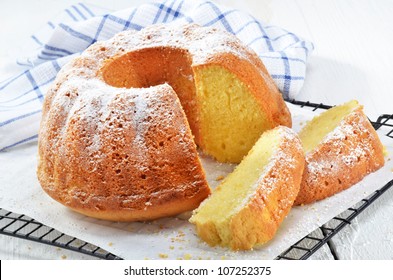 freshly baked lemon gugelhupf with icing sugar - Powered by Shutterstock