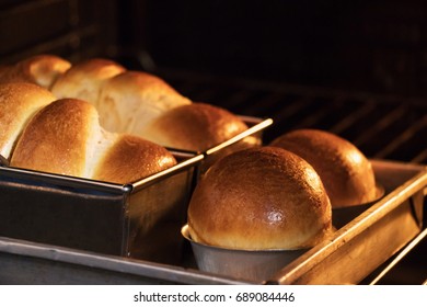 Freshly Baked Loaf Of Brioche Bread In Oven. Homemade Bakery. Making Brioche Bread.