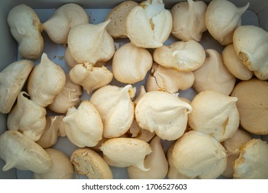 Freshly Baked Meringue In A Cookie Tin