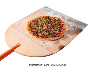 Freshly baked pizza on a wooden shovel. Isolated on a white background. Saved clipping path.