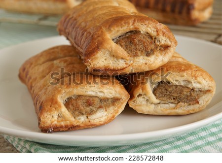 Freshly baked pork sausage rolls a traditional snack of sausagemeat baked in puff or flaky pastry