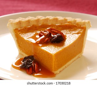 Freshly Baked Pumpkin Pie With Pecans, Cranberries And A Carmel Sauce