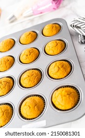 Freshly Baked Pumpkin Spice Cupcake Cooling In Cupcake Pan.