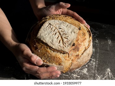 Freshly baked rye bread close up photo. Homemade sourdough bread. Healthy eating concept.  - Shutterstock ID 1933059977
