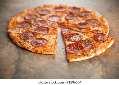 Freshly Baked Thin Crust Pepperoni And Cheese Pizza