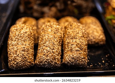 Freshly Baked Whole Grain Bread Rolls with Sesame Seeds