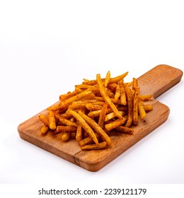 Freshly cooked French fries baked with cheddar cheese, jalapeno and Sauce closeup on a plate. wood background - Shutterstock ID 2239121179
