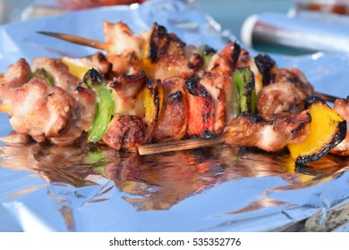 Freshly Cooked Shish Kebabs On Tin Foil In A Kitchen