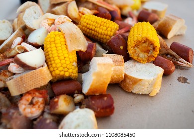 Freshly Cooked Southern Boil with Shrimp, Corn, Sausage, Potato, Onion, and Bread