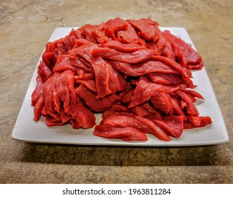 Freshly Cut Beef Strips Ready For Marinade And Making A Beef Jerky By Drying