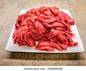 Freshly Cut Beef Strips Ready For Marinade And Making A Beef Jerky By Drying