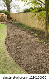 Freshly Dug Empty Flower Bed Ready To Plant In A Garden