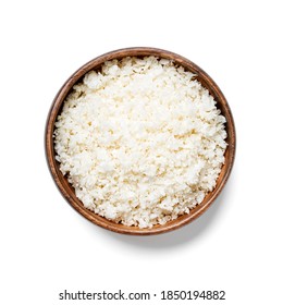 Freshly Grated Raw Cauliflower Rice In Wooden Bowl Isolated On White Background