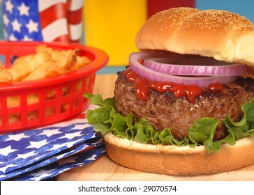 Freshly grilled hamburger in a 4th of July setting - Powered by Shutterstock