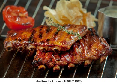 freshly grilled ribs and tomato