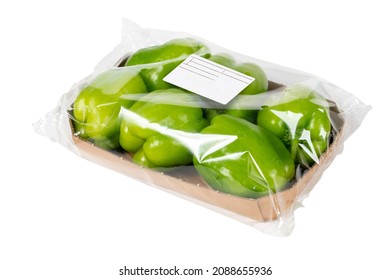 Freshly harvested green peppers packaged for sale at the market - Powered by Shutterstock