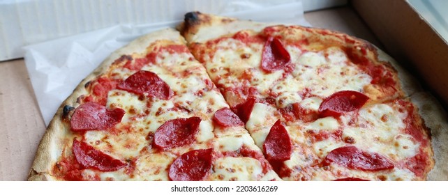 Freshly made delicious thin crust Pe Pizza. Selective focus and a little depth of field - Shutterstock ID 2203616269
