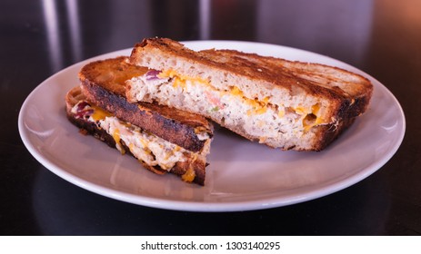 Freshly Made Grilled Tuna Melt Sandwich With Cheddar Cheese And Whole Wheat Bread.