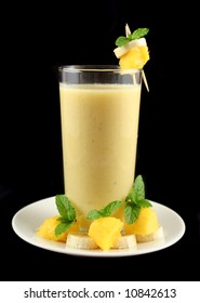 Freshly Mixed Banana And Mango Smoothie Ready To Serve.