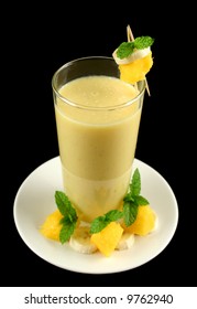 Freshly Mixed Banana And Mango Smoothie Ready To Serve.