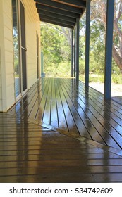 Freshly Oiled Merbau Hardwood Deck Under The Veranda Of An Australia Home.