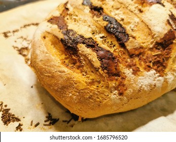 Freshly Out Of Oven Slightly Burnt Home Made Loaf Of Bread