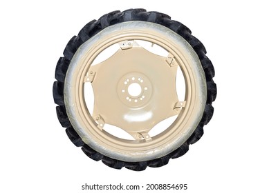 Freshly painted rims in a light color from a farm tractor, isolated on a white background with a clipping path. - Powered by Shutterstock