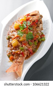 Freshly Prepared Thai Style Whole Fish Red Snapper Dinner With Tamarind Sauce.