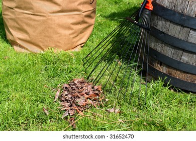 Freshly Raked Backyard, With Rake, Leaves And Recycling Yard Waste Paper Bag