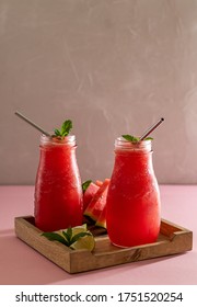 Freshly Squeezed Juice From A Watermelon On A Table. Non-alcoholic Cocktail. Healthy Eating And Fruitarianism. Vertical Orientation With Copy Space