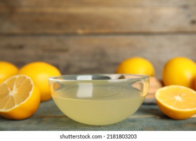 Freshly Squeezed Lemon Juice In Glass Bowl On Table