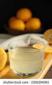 Freshly Squeezed Lemon Juice In Glass Bowl On Table