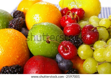 Freshly washed fruits with water droplets. Bright high key look conveys freshness.