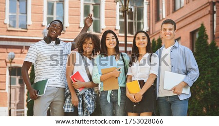 Freshmen Orientation Concept. Group Of First Year Students With Workbooks Posing Together Outdoors, Panorama With Free Space