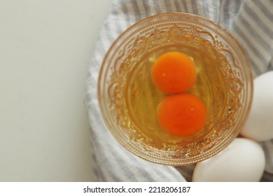 Freshness Double Raw Eggs In Glass Bowl