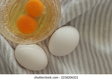 Freshness Double Raw Eggs In Glass Bowl