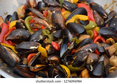 Freshwater Boiled Mussels Cooking As A Stir Fry With Organic  Vegetables In A Large Silver Wok 